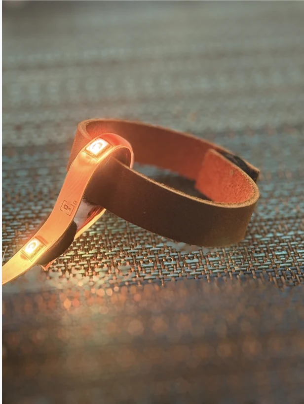 The band lit amber, standing in for a detected stress spike